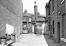 Rear of Nos. 264 (extreme right); 262; 260 and 258 (doorway below the chimney), Bramall Lane with Alderson Road in the background