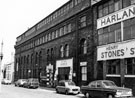 Former premises of Samuel Peace and Sons, Stag Works, No. 84 John Street; John St. Motor Cycles and No. 72 Henry Stones Ltd., file manufacturers, Harland Works
