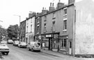 Nos. 174, Nu-Wave, ladies hairdresser; 176; Mr. F. Mohammed, off licence; 180, Little Bread Shop; 182-184; 186, Sun Po, chinese takeaway and 188, Barnsley Road 