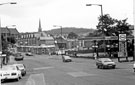 Barnsley Road with the junction of Skinnerthorpe Road right looking towards St. Cuthberts Church (left) and the spire of Trinity Methodist Church, Fir Vale