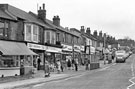 Nos. 21, J. H. Watson, butcher; 23, G. T. News; 25, Mitchell DIY Shop; 27, Smiths Cleaners Ltd., 29, etc., Bellhouse Road