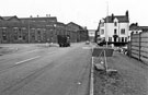 Brightside Lane showing British Steel, River Don Works at the junction of Upwell Street and No.720, Wellington Inn at the junction with Hawke Street (right)