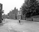 View: s25264 Church Street, Ecclesfield from the junction with St. Mary's Lane showing the sign for the Black Bull public house looking towards the former Reading Rooms