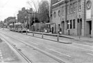 Supertram No. 9 approaching Hillsborough Supertram Stop, Langsett Road with former Hillsborough Baths right