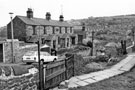 View: s25734 Nos. 1-11, former almshouses and 13, Ivanhoe Road originally called Ivy Road off Stannington Road showing Bole Hill School on the skyline