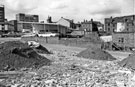 View across demolished property on Hicks Lane to Workhouse Lane and West Bar, with Moseley Arms public house extreme left