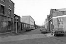 Lancaster Street looking towards Neepsend Lane with Jim McAnearney, machine tools right and Herbert (the sign appears to read Herbert?) Engineering Ltd. left