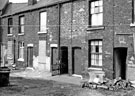 Rear of Nos. 56; 54; 52; 50 and bricked up 49, Hill Street looking towards the rear of housing on John Street left Rear of Nos. 56; 54; 52; 50 and bricked up 49, Hill Street looking towards the rear of housing on John Street left