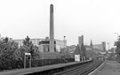 Attercliffe Road Station looking towards Bernard Road Incinerator with Hyde Park Flats and St. John's Church Park in the background 