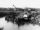 View: s26102 Construction of Tinsley Viaduct, M1 Motorway over the River Don with Hadfields East Hecla Works in the background