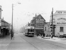 Tram No. 103 approaching The New Inn, No. 183 Duke Street at the junction with Bernard Street, Park with Norfolk Picture Palace left and C and A Reed Ltd., funeral directors in the background Tram No. 103 approaching The New Inn, No. 183 Duke Street at the junction with Bernard Street, Park with Norfolk Picture Palace left and C and A Reed Ltd., funeral directors in the background