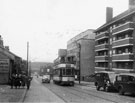 View: s26150 Tram No. 109 approaching Duke Street Flats with No. 86, Robin Hood public house with Embassy Court in the background