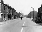 Nos. 23-47, Newhall Road looking towards Nos. 49 - 51, Vine Tavern (left) at the junction with Paget Street and Sanderson Brothers and Newbould Ltd., Attercliffe Steel Works