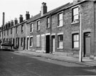 Nos. 193; 195; 197 etc.,(right to left), Earsham Street, Burngreave looking towards the chimney of Sutherland Road Baths