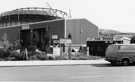 View: s26219 Crantyle Ltd., electrical and mechanical engineers and The Diner, Farfield Road with Gas Holder from Neepsend Gas Works in the background