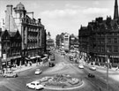 View: s26243 Elevated view of Fargate looking towards Kemsley House, High Street with The Yorkshire Penny Bank right; Cantors, furniture store;; Dean and Dawson Ltd. travel agents; Legal and General Assurance left 