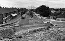 View: s26264 Sheffield Parkway roundabout construction at Handsworth showing shops Nos. 132, G.T News; 130; 128/6 etc., Handsworth Road 