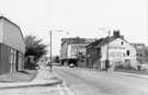 View: s26389 Penistone Road from the junction with Fawley Road looking towards Nos. 202-206 and No. 230, Presto Tools showing the sign for Weir Head Garage right