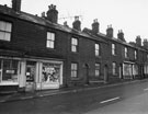 View: s26405 No. 56, S. Beres, pork butcher; 54, drapers; 52-48 and 46, Fish and Chip Shop, Penistone Road North 