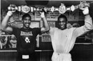 Boxer, Herol Bomber Graham (right) with his British Middleweight Championship Belt