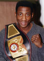 Boxer, Johnny Nelson with his World Boxing Federation belt
