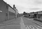 Hogan Bros and Sons, brass founders (right), Russell Street from Alma Street/ Green Lane looking towards No. 62, White Hart Inn Hogan Bros and Sons, brass founders (right), Russell Street from Alma Street/ Green Lane looking towards No. 62, White Hart Inn