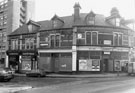 View: s26648 Nos.2-4, Almadina Cafeteria;  6, Portland Street; Nos. 68, Lambert Brothers, green grocers, Upperthorpe Road with Kelvin Flats in the backgound left