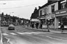 Nos. 695, Firth Park Home Bakery; 693, In and Out, newsagents; 691, Victor Unwin, butcher and 689, Blaskeys, Staniforth Road looking towards the junction with Irving Street (first right) from Main Road