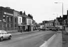 Nos. 661, Yorkshire Bank; 665 Darnall fried Chicken; 667 etc, Staniforth Road from Ronald Road looking towards Kirby Road right