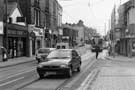 Middlewood Road looking towards Langsett Road / Holme Lane with Hillsborough Road right; Threshers Drinkstore No. 6; Woodcock Travel No. 8