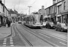 View: s27018 Meadowhall bound Supertram No. 21, Middlewood Road looking towards No. 61, Coventry Building Society at the junction of Dykes Hall Road