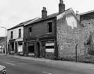 Derelict Nos. 89/91, All Nations Tabernacle of the Church of God and Prophecy; 93 and 95, Stanley Burrough, upholsterer, Gower Street
