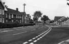 Mason Lathe Road from the junction with Woolley Wood Road looking towards The Penguin public house and the junction with The Ravine, Shiregreen 