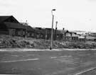 Looking across house cleared land on Wilfrid Road and Bridport Road towards Kayser Ellison and Co., Darnall Steel Works Looking across house cleared land on Wilfrid Road and Bridport Road towards Kayser Ellison and Co., Darnall Steel Works