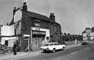 No. 128, S. Burley, greengrocer and 126, Woodbourn Road with housing on Ripon Street in the background