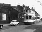 Tram No. 483 heading for Meadowhed and Bus No. 63 heading for Woodseats on Spital Hill Tram No. 483 heading for Meadowhed and Bus No. 63 heading for Woodseats on Spital Hill