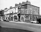 View: s27280 No. 18, East House public house; 20, Winstons; 22, The Fish Tank; 24, Wigfalls, Spital Hill from the junction of Spital Street