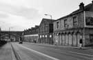 Derelict No. 47 former premises of A. Smith Motorcyles Ltd. (originally the Lodge Inn), and former premise of Bentley Brothers Ltd., Wicker Arches Garage  Spital Hill looking towards the Wicker Arches