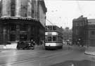 Tram No. 150 on West Street passing the junction with Holly Street 