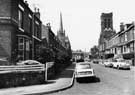 Highfield Place from Colver Road looking towards London Road with St. Barnabas Church (right) and Brunswick Trinity Methodist Church