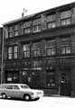 View: s28184 Supreme Tubes Ltd. and Worton Temprell occupying the former premises of D. F. Hogan and Co., saw manufacturers, Clifton Works, John Street