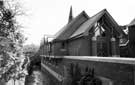 Wycliffe Independent Church, Hickmott Road with the River Porter (Porter Brook)left Wycliffe Independent Church, Hickmott Road with the River Porter (Porter Brook)left