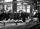 Queen Elizabeth II and HRH Duke of Edinburgh accompanied by Lord Mayor J.H. Bingham viewing finished products at the English Steel Corporation, River Don Works, Brightside Lane during the royal visit   