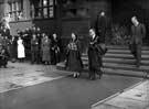 Queen Elizabeth II and HRH Duke of Edinburgh leaving the Town Hall with Lord Mayor, J.H. Bingham  after lunch