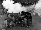 A 21 gun royal salute fired by 271st (Sheffield) Field Regiment R.A.(T.A.) on a site in Devonshire Street during the royal visit of Queen Elizabeth II and HRH Duke of Edinburgh