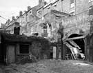 Yard and stables at the rear of Nos. 22-24 Burngreave Street with rear of housing Burngreave Bank in the background
