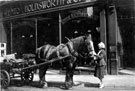 Miss Kitty Seddon and horse and dray outside Renton, Hodsworth and Co. Ltd., colliery engineers, No. 49 Norfolk Street