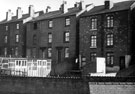 Grove Street, Pitsmoor, showing Court No. 9, house No.1; Court No.7, houses Nos.3, 2 and 1 (with the pigeon lofts); steps, Court No.5, house No.1; and rear of No. 25. Viewed from Courts on Marshall Street. Demolished Nov. 1960. 