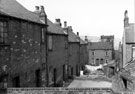 Rears of Nos. 5 - 14 (left), Hinchliffe Walk looking towards St. Stephen's Church, also showing Nos 88 and 86 Bramwell Street (centre of picture)