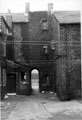 Court 7, House Nos. 7 (left), 1 and rear of No. 27 (right of passage), Oborne Street looking through passageway to the playground, Burngreave Redevelopment Area